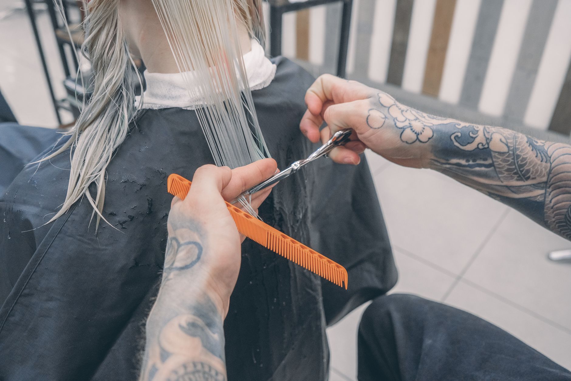Barber applying hot towel to client in Cairo